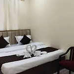 Om Palace Inn