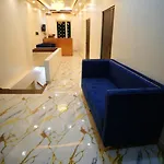 Om Palace Inn