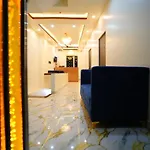 Om Palace Inn